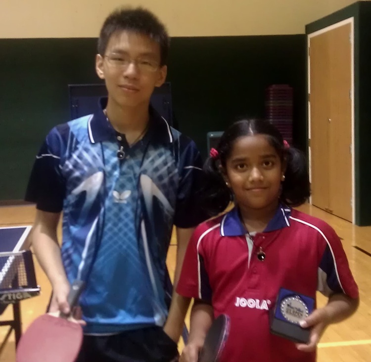 Samuel Liu (left) and Lavanya Pandian (right) with their VQ Table Tennis Bat Pendants